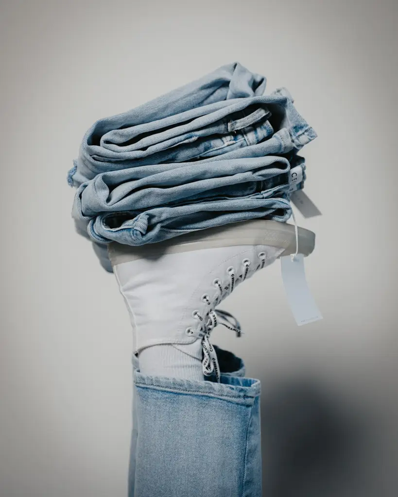 Stack of folded blue denim jeans